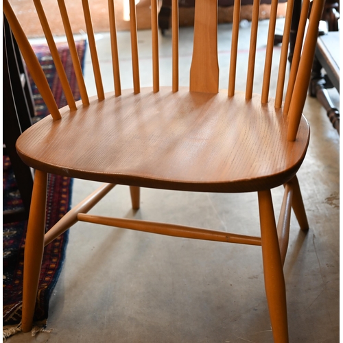 340 - An Ercol (model 472) elm and beech spindle back Windsor chair gold label to back underside seat, cir... 