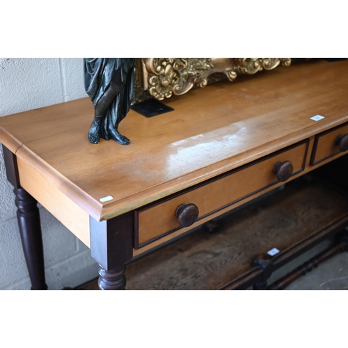 343 - A South African yellow wood hall table with two frieze drawers, stained turned handles and supports,... 