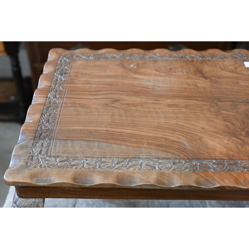 347 - # An Indian influenced hardwood coffee table, rectangular top carved with foliate decoration, 92 cm ... 