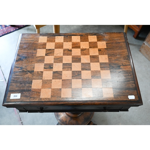 354 - A Victorian rosewood and maple games table with folding chessboard top and single drawer, circular p... 