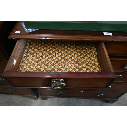 363 - A 19th century mahogany chest of two short over four long drawers with rose-cast brass handles, stan... 