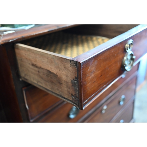 363 - A 19th century mahogany chest of two short over four long drawers with rose-cast brass handles, stan... 