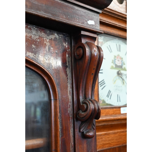 374 - # A Victorian mahogany bookcase with glazed doors enclosing four shelves, standing on deep plinth ba... 