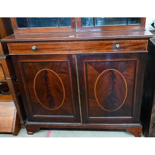 379 - A 19th century mahogany inlaid cabinet bookcase with astragal glazed doors over shallow drawer and p... 