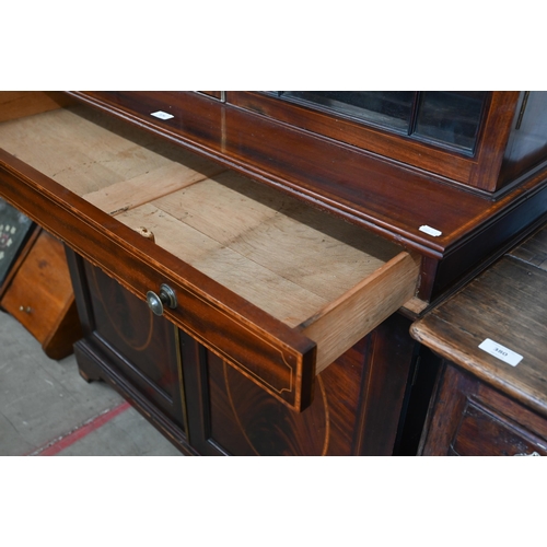 379 - A 19th century mahogany inlaid cabinet bookcase with astragal glazed doors over shallow drawer and p... 