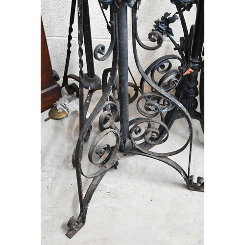 388 - Three Victorian wrought iron standard lamps (incomplete, a/f)