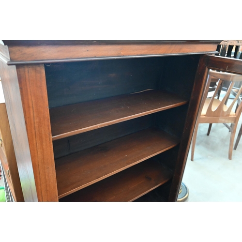 389 - A 19th century mahogany pier cabinet with glazed door enclosing three shelves, 84 cm wide x 30 cm de... 