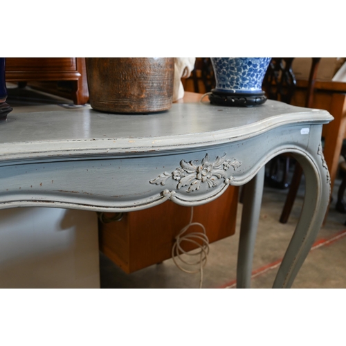 406 - A French grey painted serpentine console table with floral carved decoration, 112 cm wide x 38 cm de... 