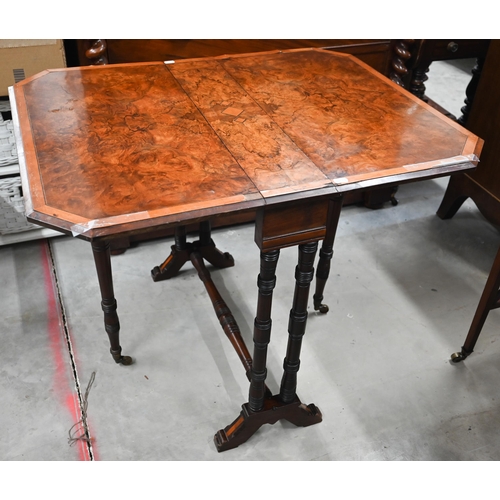 417 - A Victorian burr walnut inlaid Sutherland table on turned gateleg action base