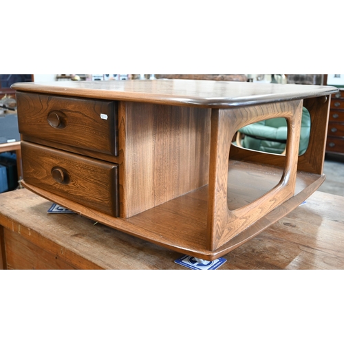 425 - A mid-century Ercol Golden Dawn elm Pandora coffee table on ball castors, 80 x 80 x 40 cm high