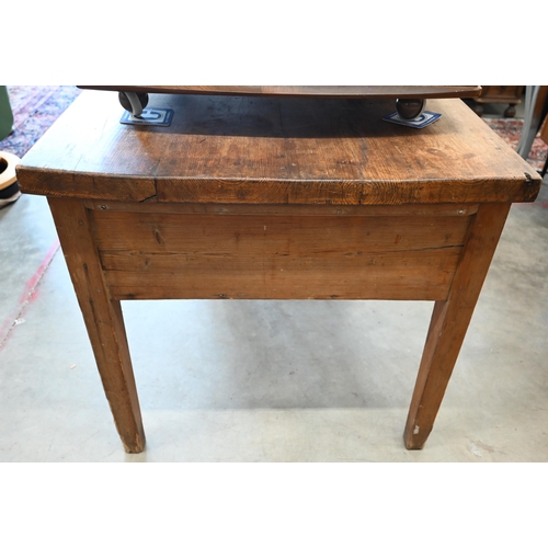 427 - An antique provincial waxed pine table with two deep frieze drawers on tapering supports, 146 cm x 8... 