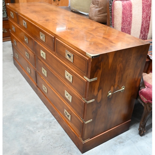 440 - Abbeycraft - Yew veneered and brass mounted campaign style sideboard with an arrangement of nine dra... 