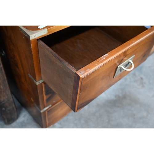 440 - Abbeycraft - Yew veneered and brass mounted campaign style sideboard with an arrangement of nine dra... 