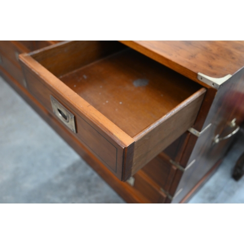 440 - Abbeycraft - Yew veneered and brass mounted campaign style sideboard with an arrangement of nine dra... 