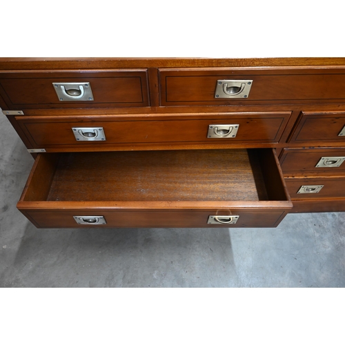 440 - Abbeycraft - Yew veneered and brass mounted campaign style sideboard with an arrangement of nine dra... 