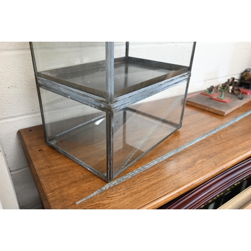 449 - A metal framed glazed three-tier counter top display cabinet, 40 cm wide x 30 cm deep x 62 cm high