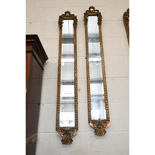 452 - Three Louis XVI style narrow wall mirrors with bevelled plates and gilded wreath moulded frames, 18 ... 