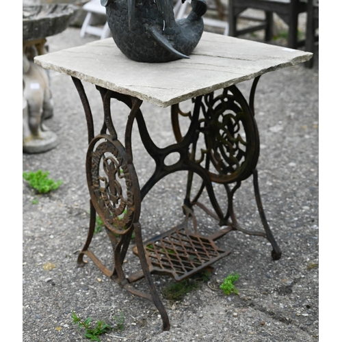 5 - A vintage cast iron Singer sewing machine treadle base with stone slab table top