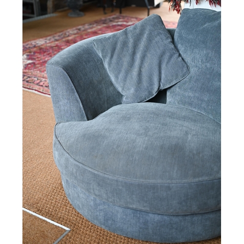 521 - A modern John Lewis blue-grey upholstered revolving loveseat c/with cushions