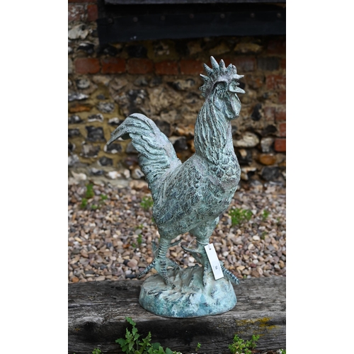 56 - A large verdigris patinated cast metal cockerel, 67 cm h and composite painted cockerel (a/f) (2)