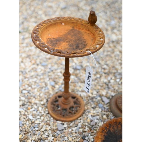 57 - A trio of weathered cast steel bird baths, the largest 54 cm h (3)