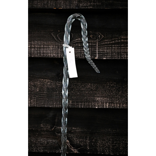 575 - A twisted glass shepherd's crook, 150 cm