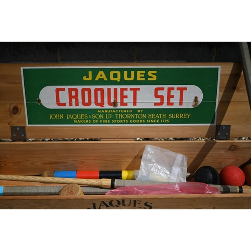 587 - A little used boxed Jacques croquet set with mallets, hoops, etc