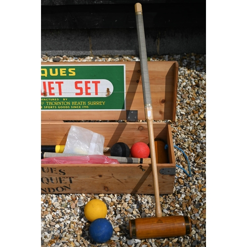 587 - A little used boxed Jacques croquet set with mallets, hoops, etc