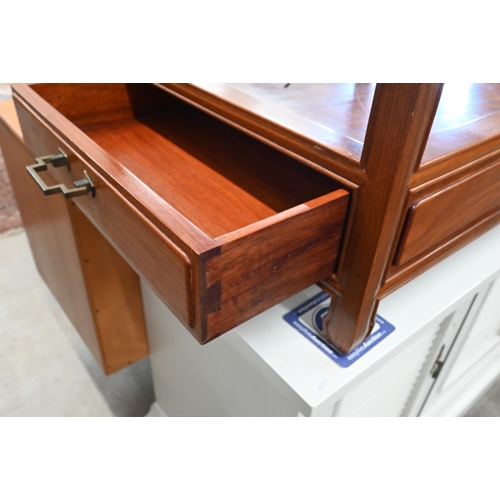 596 - A pair of Chinese rosewood two tier lamp tables with base drawer, 61 x 51 x 56 cm high (2)