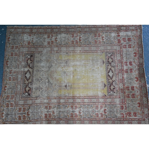 601 - An antique Anatolian prayer rug, worn, 158 x 115 cm