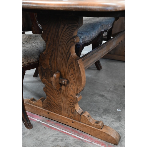 602 - A mid-century teak refectory dining table with mid-height centre stretcher, note split to top, 180 c... 