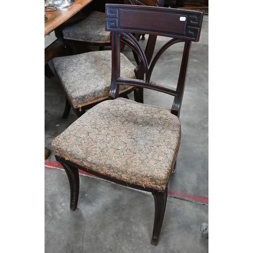 603 - A set of six Victorian mahogany bar-back dining side chairs with over stuffed seats raised on moulde... 