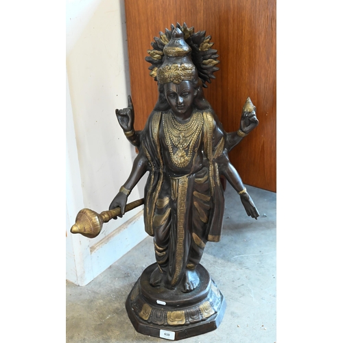 610 - A large bronze patinated brass figure of a deity, 75 cm high