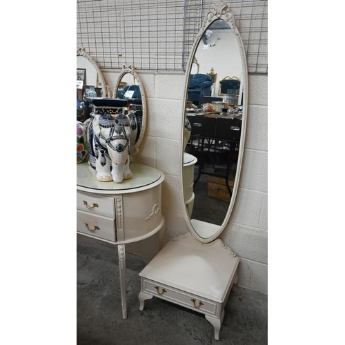 616 - A cream paint finished Italian-style mirror-backed kidney shaped dressing table by Fairyland to/w a ... 