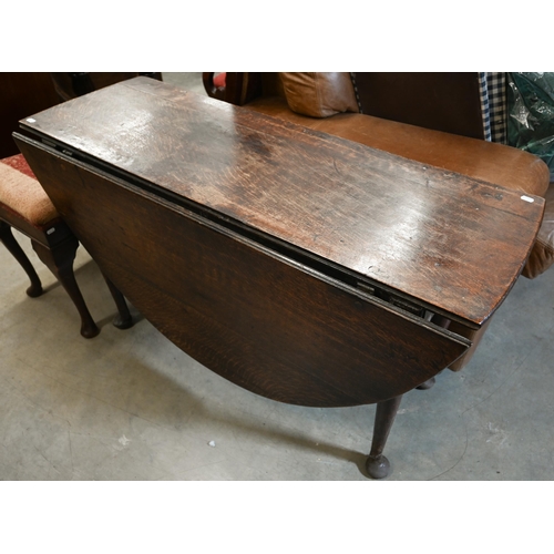 617 - # An 18th century oak gateleg table, the oval top raised on pad feet, 122 x 46 cm (150 cm open) x 71... 