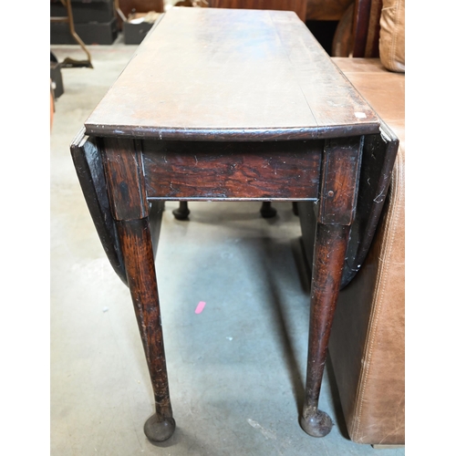 617 - # An 18th century oak gateleg table, the oval top raised on pad feet, 122 x 46 cm (150 cm open) x 71... 