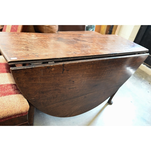 617 - # An 18th century oak gateleg table, the oval top raised on pad feet, 122 x 46 cm (150 cm open) x 71... 