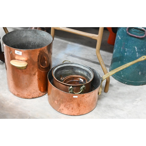 628 - A large hammered copper cylindrical vessel with brass handles to/w a hammered copper brass handled G... 