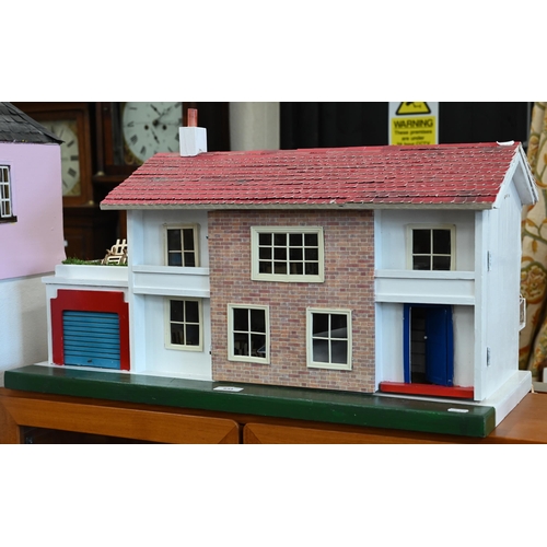 634 - Tri-Ang doll's house with red painted roof and coming with assorted furnishings and accessories, a/f