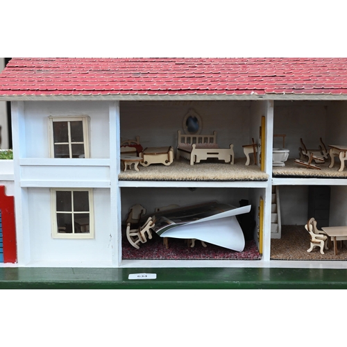 634 - Tri-Ang doll's house with red painted roof and coming with assorted furnishings and accessories, a/f