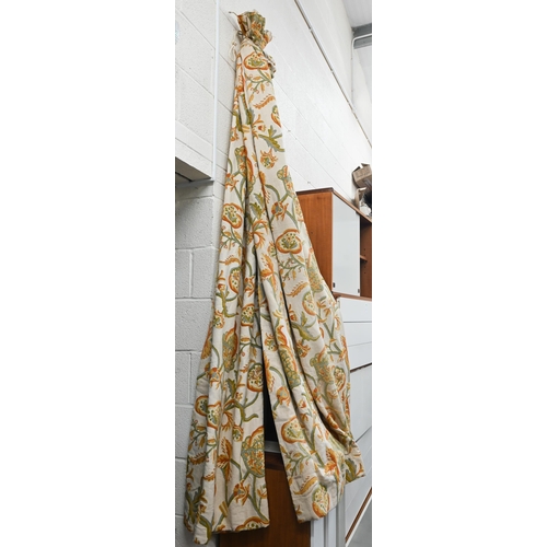 640 - A pair of crewelwork linen curtains (2)