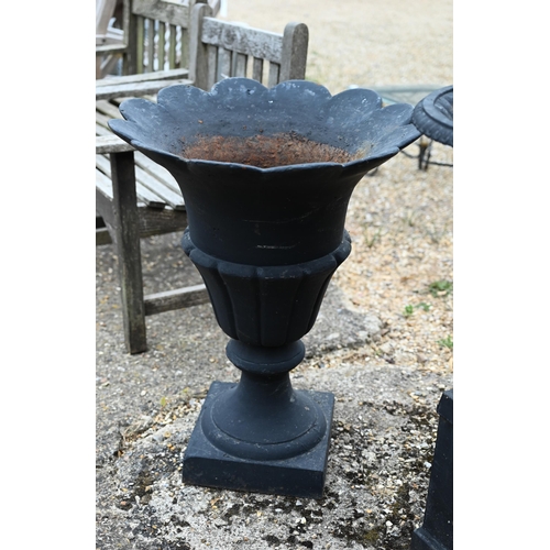 9 - A classic cast iron garden urn planter on square plinth base to/w another of flared neck design - bo... 
