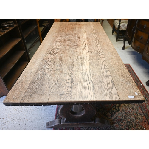 323 - An old oak refectory table with Lyre shaped trestle ends united by a centre stretcher, 213 x 91 x 75... 