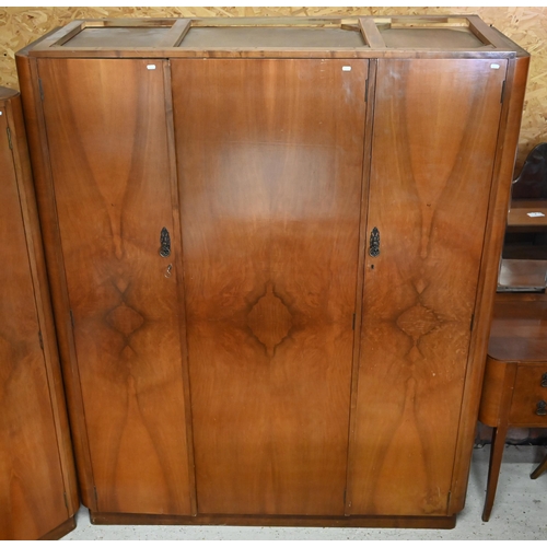 470 - # 1950s walnut bedroom suite comprising dressing table and stool, chest of three drawers, two wardro... 