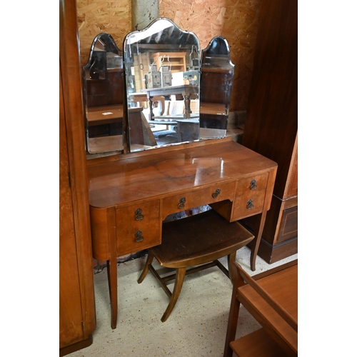 470 - # 1950s walnut bedroom suite comprising dressing table and stool, chest of three drawers, two wardro... 