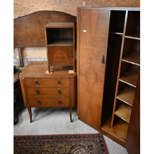 470 - # 1950s walnut bedroom suite comprising dressing table and stool, chest of three drawers, two wardro... 