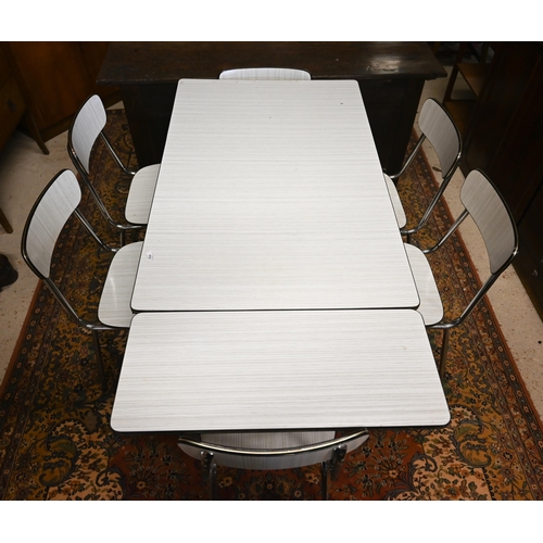 473 - A 1950s 'Tavo' (Belgium) melamine and chromed dining table and six chairs, 110 cm w x 70 cm d x 75 c... 