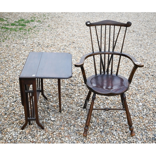 509 - An antique stick back elbow chair to/w an Edwardian Sutherland table (2)