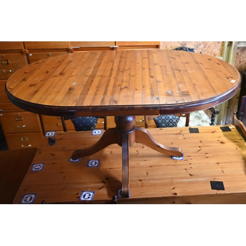 553 - # A stained pine extending dining table, 156 x 110 x 45 cm h, to/w eight chairs (6 standard and 2 ca... 