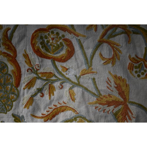 640 - A pair of crewelwork linen curtains (2)